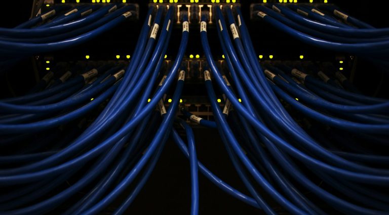 Abstract design featuring a series of blue rectangles stacked in varying sizes.