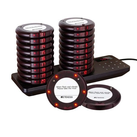 A stack of wireless charging discs with a charging pad, featuring red indicators.